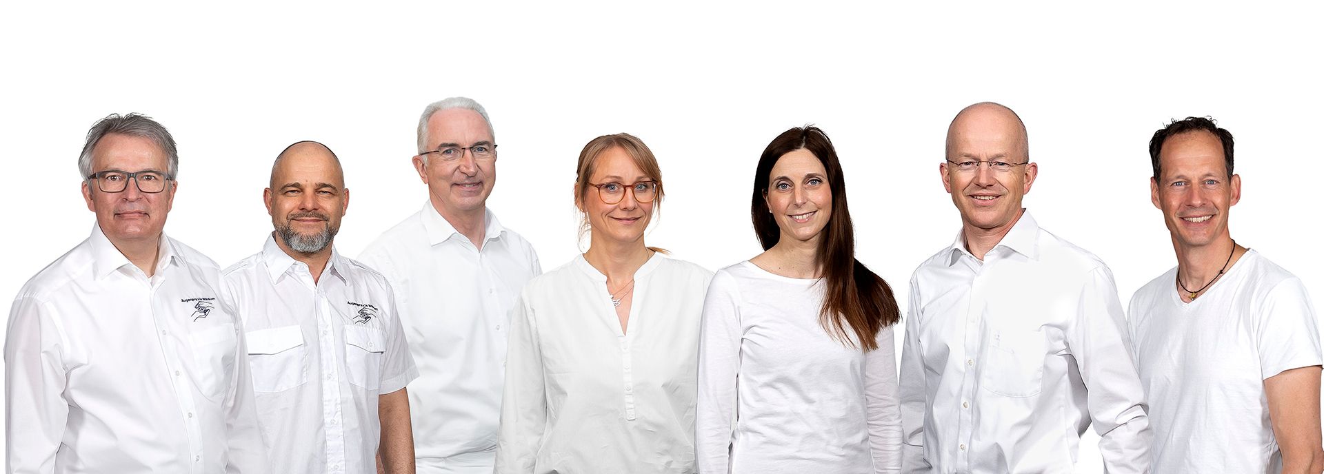 Gruppenfoto Ärztinnen und Ärzte ÜBAG Klischies Partner